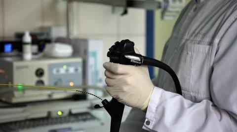 The Endoscope is in the Hands of a Doctor Stock Footage 61384032