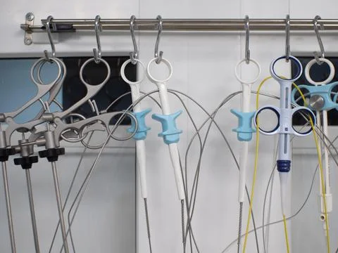 Endoscopy instrument hanging on hooks in the operating room. The sterile Stock Photos