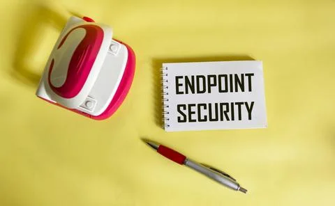 ENDPOINT SECURITY text on notepad and yellow background. business concept Stock Photos