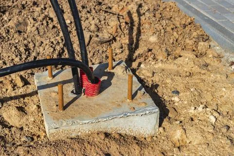 The ends of the electrical cable in the trench. electrical cable installation Stock Photos