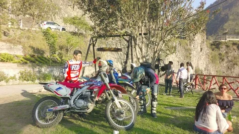 Enduro Bikers Making A Stop At Park Stock Footage 88338721