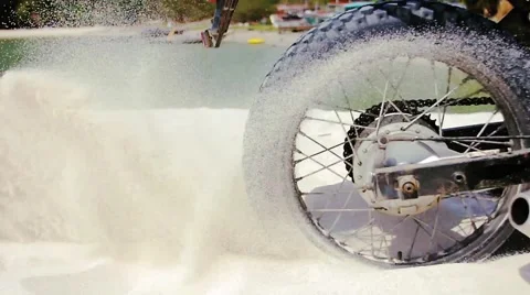 Enduro Motorcycle Slipping Wheel in Sand in Slow motion Close up 動画素材 63157553