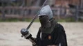 Enemy calling out knight for a fight. Historical reenactment of medieval battle HD Footage