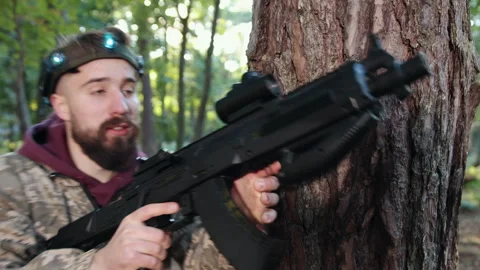 Enemy target, tactical position, camouflage attire Stock-Footage 302926290