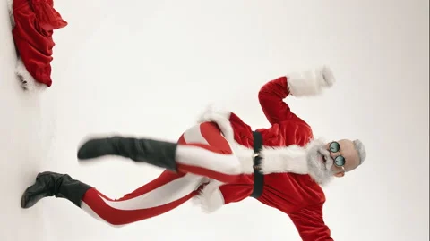 Energetic dance to active music of fun Santa, happy holiday New Year, Christmas Stock Footage 141027499