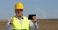 Energetic Industry Wind Turbines Engineer Tablet Planning Smile Thumbs Up Camera 4k or 4k+ Resolution