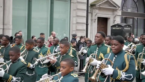 Energetic Marching Band Performing in Vibrant London Parade Video stock 333665617