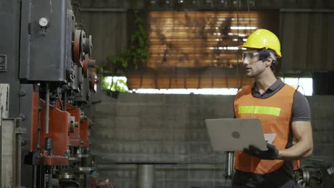 Energetic mechanical engineer hold laptop computer to inspect mechanical Stock-Footage 158164805