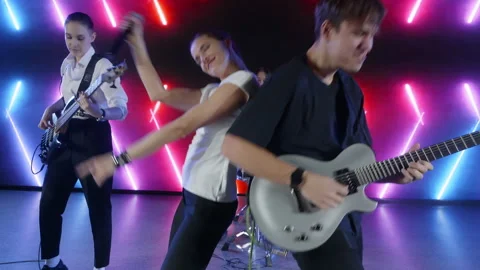 Energetic music band performing live on stage Stock Footage 315482953