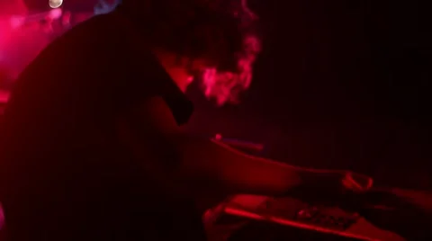 Energetic piano player performing on stage live 스톡 동영상 55874541