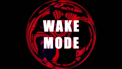 Energetic Red Globe with WAKE MODE text during digital transition for techn.. Stock Footage 344036779
