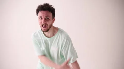 Energetic, young, happy man dressed casual, oversized stylish outfit, dance Stock Footage 303347922
