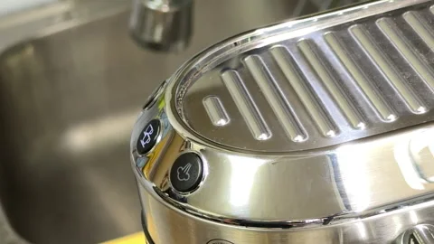 Energizing Morning Ritual: Espresso Machine Brews with a Rich Rhythmic Hiss Video stock 328796073