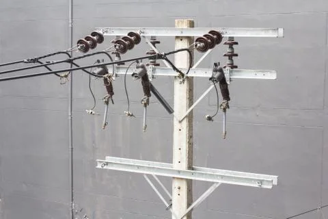Energy and technology: electrical post  with power line cables Stock Photos