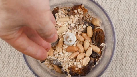 Energy Balls. Step by step recipe cooking. Ingredients  poured  blender bowl. p3 Stock Footage 123292996