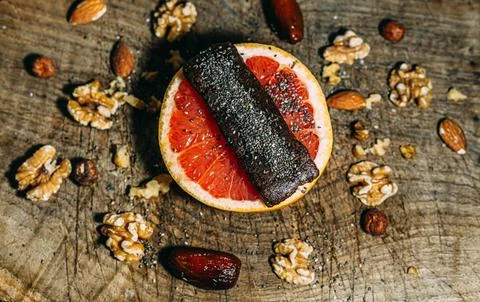 Energy bar on a grapefruit Stock Photos