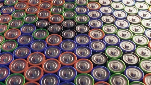 Energy concept Background made of many colorful alkaline AA batteries moving. Video stock 169147949