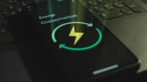 Energy Conservation inscription on smartphone screen. Graphic presentation with Stock Footage 271124635