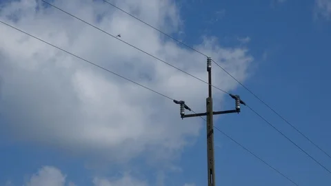 Energy Pole - Passing Clouds and Blue Sky Stock Footage 94703179