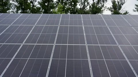 Energy production using solar panels, combining nature and technology. Stock Footage 320263620