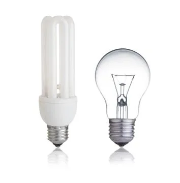 Energy save light bulb normal bulb and with reflection Stock Photos