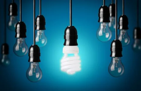 Energy saving and simple light bulbs.blue background 库存照片