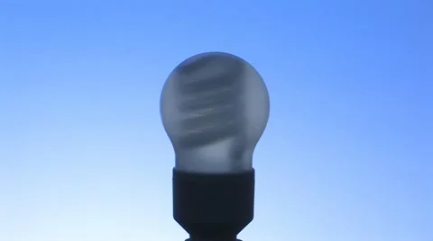 Energy-saving bulb off, center Stock Footage 11609355