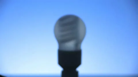 Energy-saving bulb, focus pull, light on 2 Stock Footage 11609351