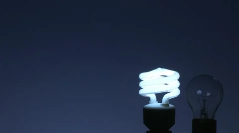 Energy-saving bulb vs conventional bulb 1 Video stock 11609898