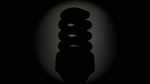 Energy saving compact fluorescent light bulb Stock Footage 90019635