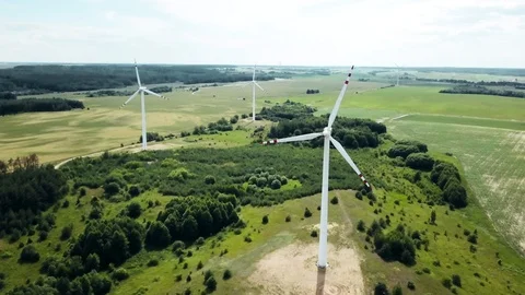 Energy saving concept with panorama view from wind turbine construction in field Stock Footage 121505111