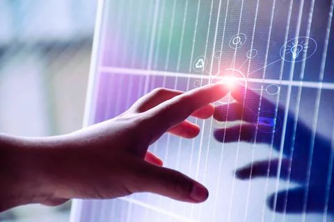 Energy saving concept Protect the environment. people finger touching solar p Stock Photos
