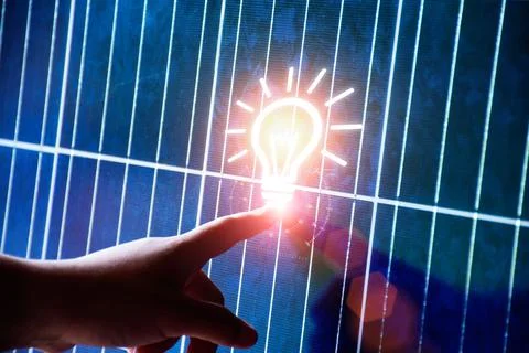 Energy saving concept Protect the environment. people finger touching solar p Stock Photos