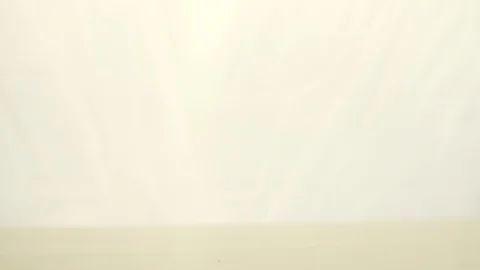 Energy-saving fluorescent light, falls to the surface. White background. Vídeos de archivo 90403021