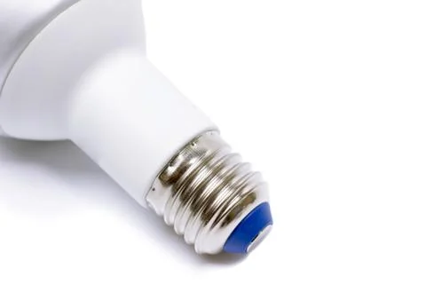 Energy saving lamp with e27 socket isolated on white background Stock Photos