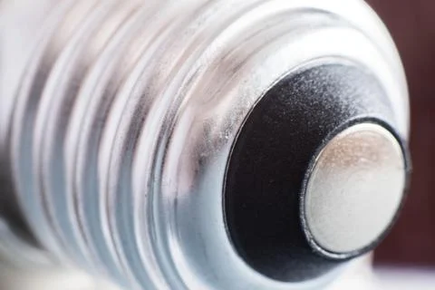 Energy saving led bulb E27 closeup isolated on white background Фото