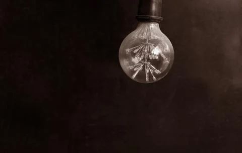Energy saving LED light bulb on a dark background Stock Photos