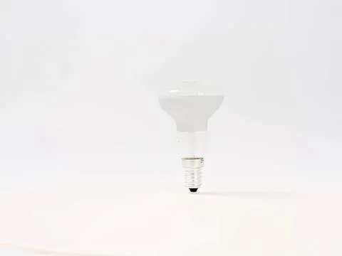 Energy saving led light bulb on a white background Stock Photos