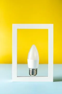 Energy saving light bulb in a frame, concept, good idea Foto stock