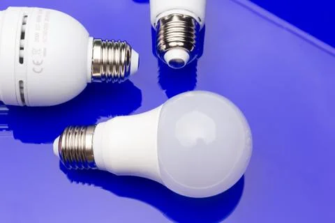 Energy saving light bulb to save money and electricity. Stock Photos