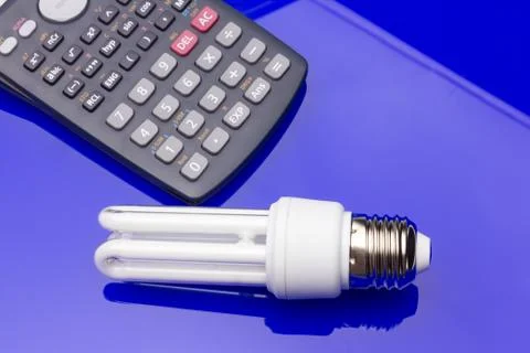 Energy saving light bulb to save money and electricity. Stock Photos