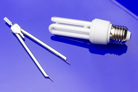 Energy saving light bulb to save money and electricity. Stock Photos