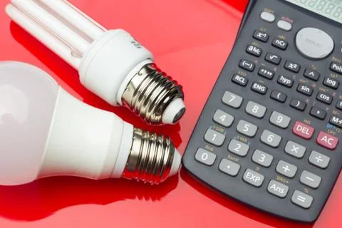 Energy saving light bulb to save money and electricity. Stock Photos