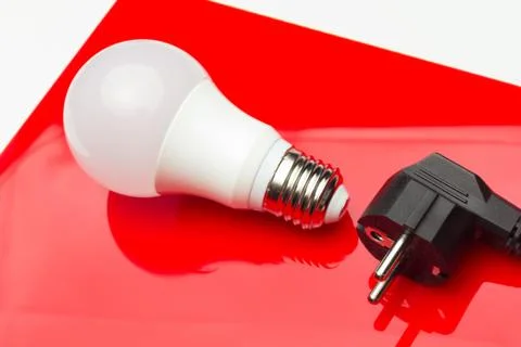 Energy saving light bulb to save money and electricity. Stock Photos