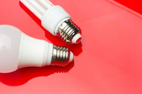 Energy saving light bulb to save money and electricity. Stock Photos