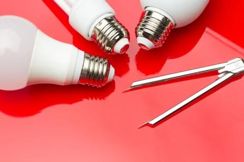 Energy saving light bulb to save money and electricity. Stock Photos
