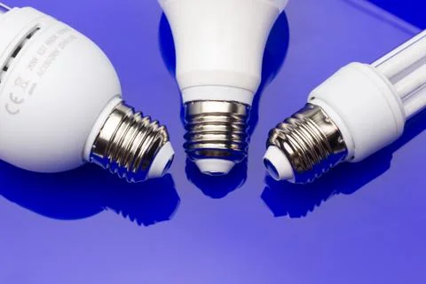 Energy saving light bulb to save money and electricity. Stock Photos