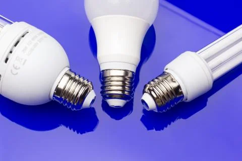 Energy saving light bulb to save money and electricity. Stock Photos