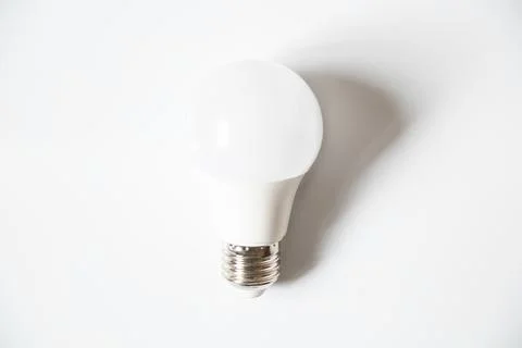 Energy saving light bulb on a white background , light and bulb Stock Photos