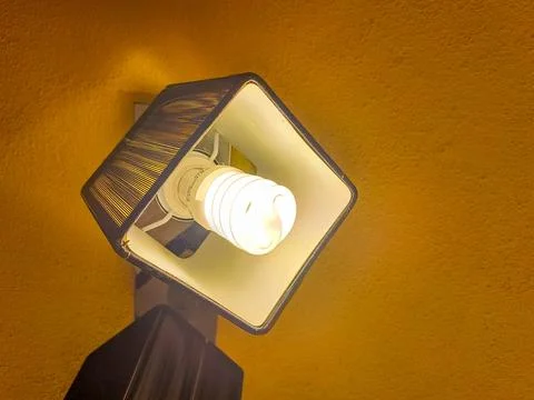 Energy saving lightbulb. Save energy concept. Flat lay, top view, copy space. Stock Photos